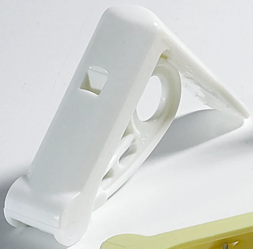 Pince nappes plastique blanc Réduction